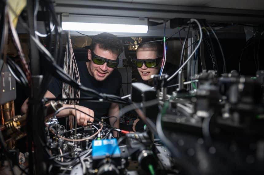 Dougal Main and Beth Nichol working on the distributed quantum computer.