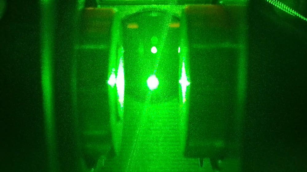 Optical Trap. Catching a micron-sized particle is challenging. To get the job done, two laser beams come in handy. Acting like tweezers, they can trap, secure, and charge a solitary particle.