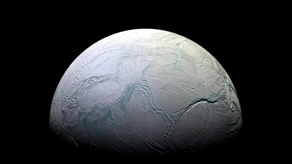 Saturn's moon Enceladus photograph as taken by NASA's Cassini spacecraft.