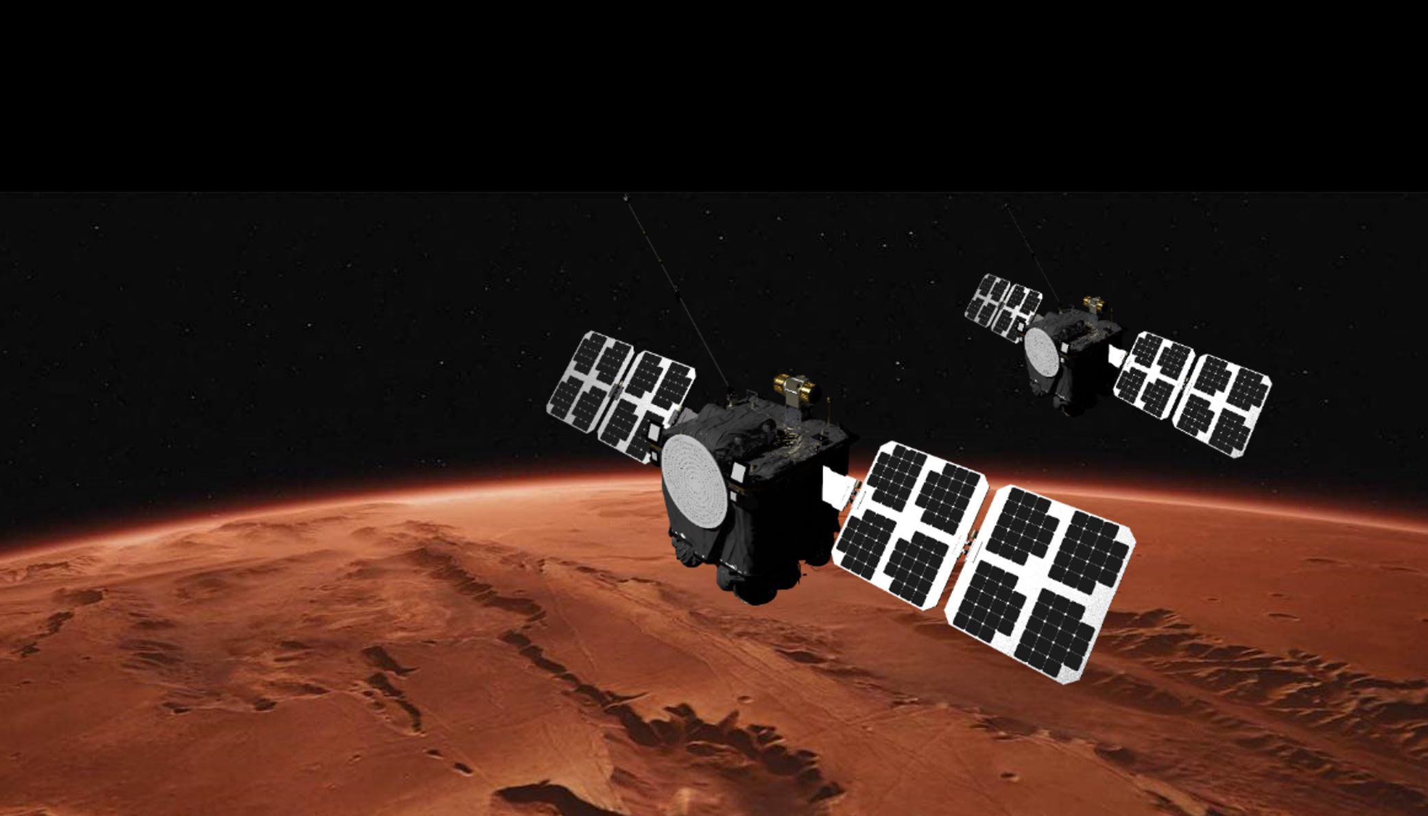 An artist's rendition of the two ESCAPADE satellites in orbit around Mars.