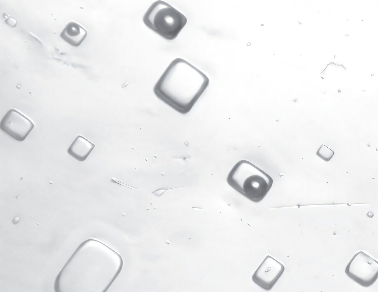 Microscopic image of fluid inclusions in 1.4-billion-year-old halite crystals, which preserve ancient air and brine.