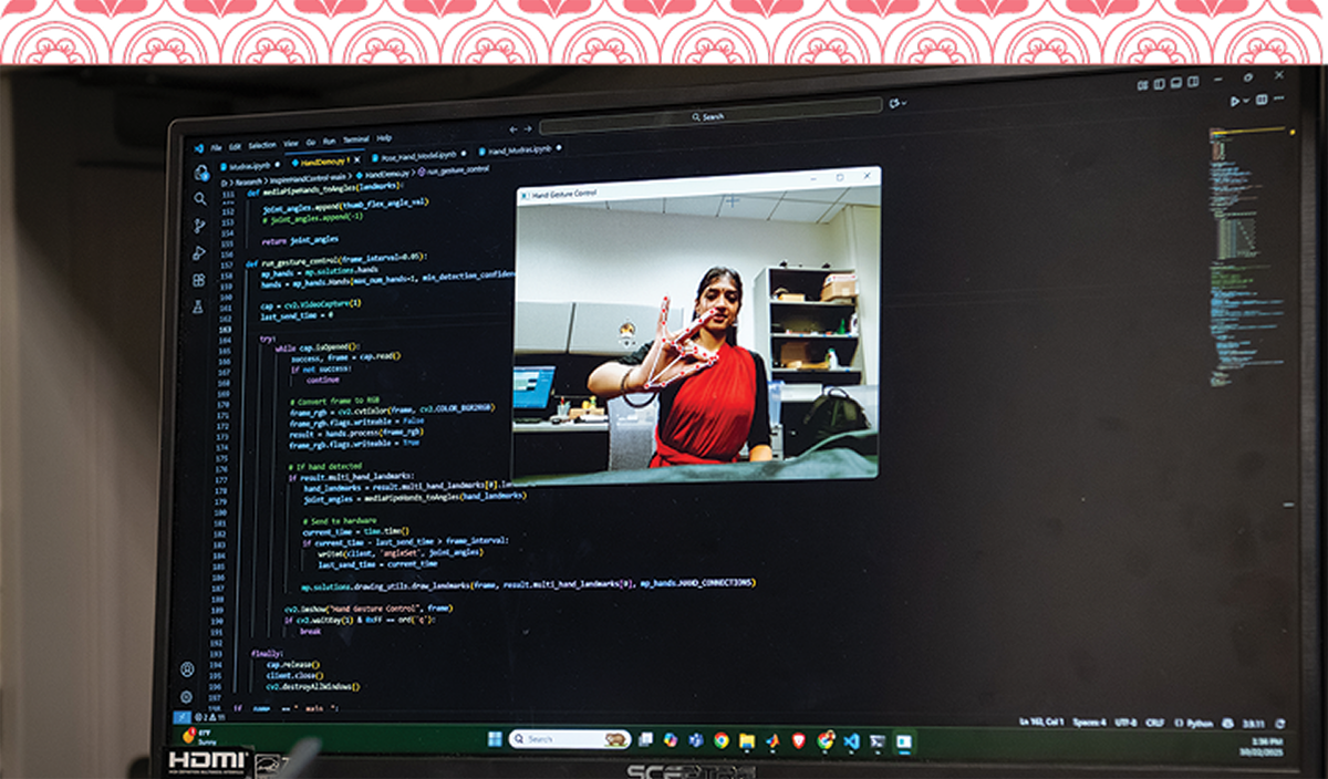 Ashwathi Menon, co-caption of the Adaa Indian fusion dance team, stopped by the lab for a photo shoot in October. Here she appears on the computer screen as the team demonstrates how to use a simple camera and software system to recognize hand movements.