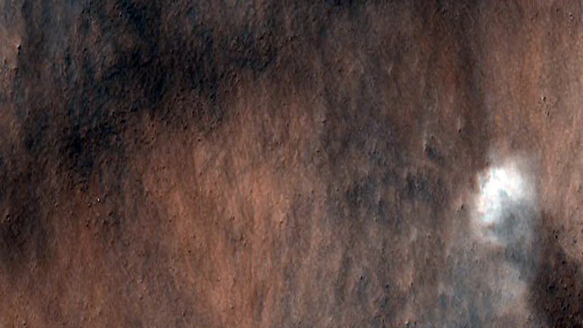 An overhead view of a  dust storm on Mars. 