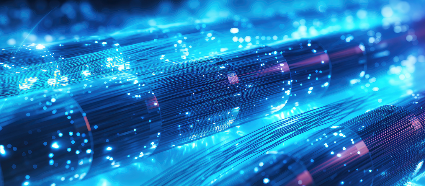 Scientists demonstrated quantum teleportation over fiber-optic cables carrying live internet data, opening a path to real-world quantum networks.
