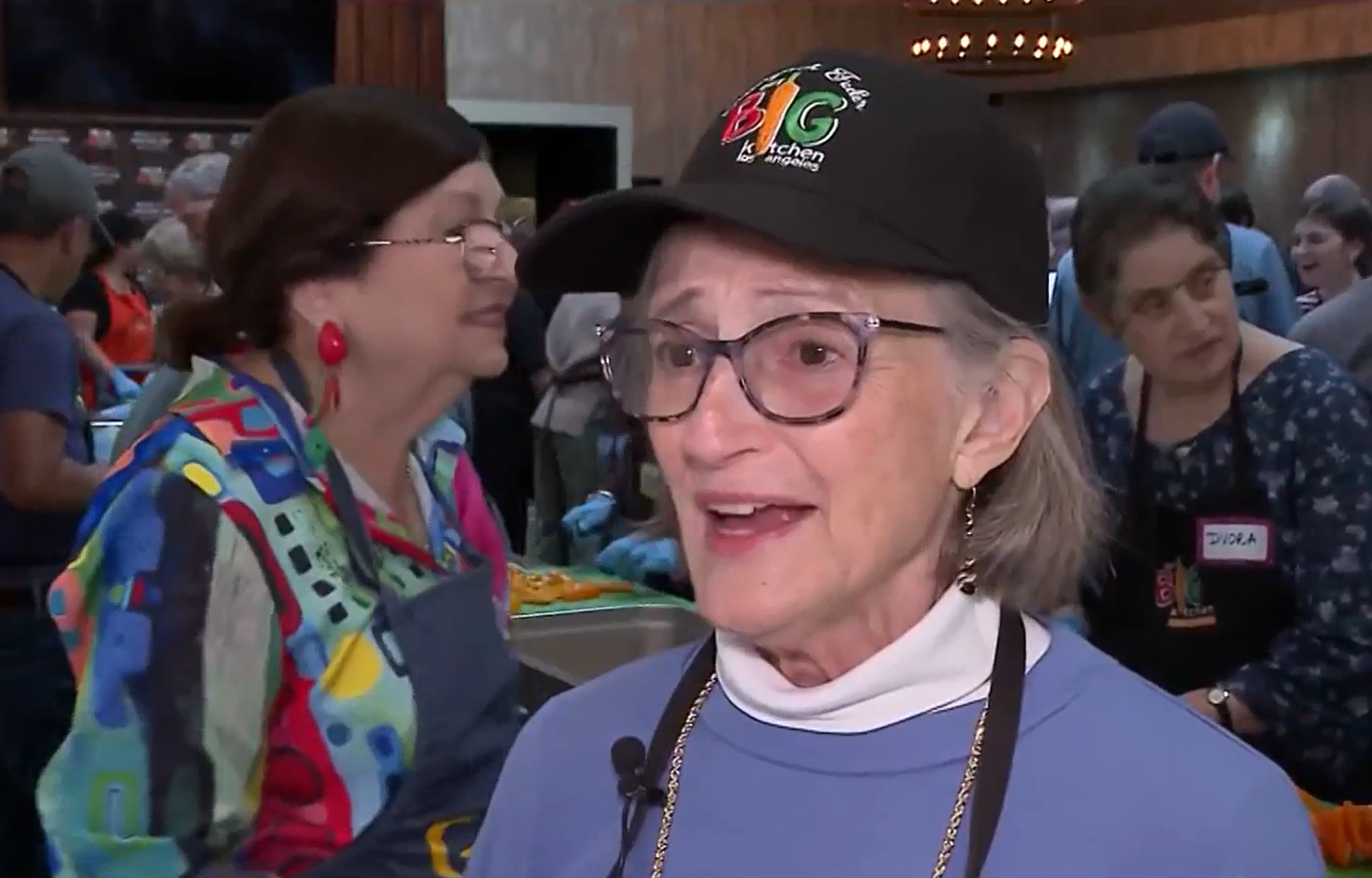 A Los Angeles woman marks her 80th birthday by organizing volunteers to prepare hundreds of meals for those in need.