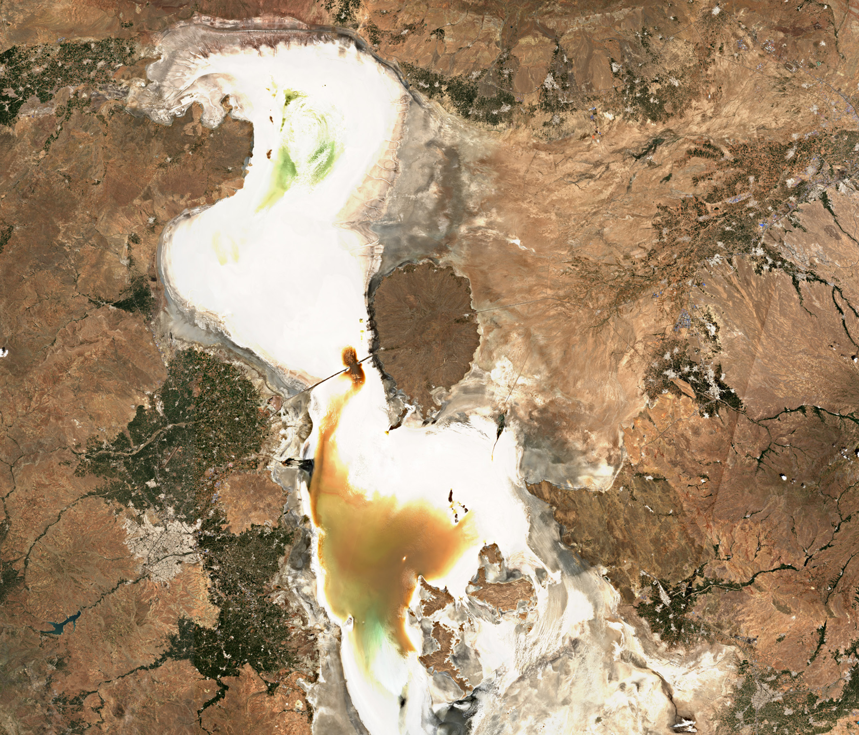 Once one of the largest hypersaline lakes of the world, Lake Urmia in northwest Iran has dried up due to increased upstream water use and diversions that reduced water inflows to the lake, a situation exacerbated by climate change and more frequent droughts, turning the lake bed into a new source of salt and dust storms.