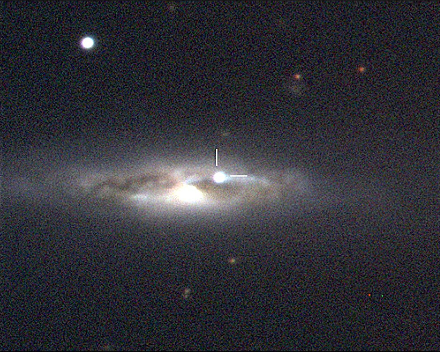 Composite gri image of NGC 4388 showing SN 2023fyq, captured by the Las Cumbres Observatory on August 11, 2023. White tick marks highlight the supernova’s location.