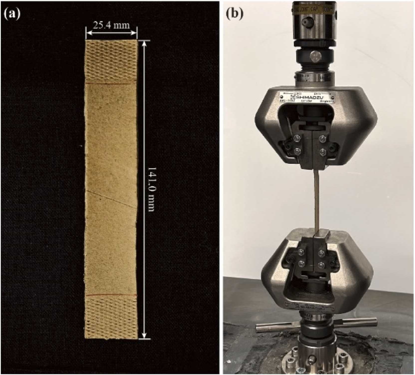 Tensile tests for the cardboard strips cut from unused cardboard tubes: (a) dimensions of the cardboard strips, and (b) tensile test setup.