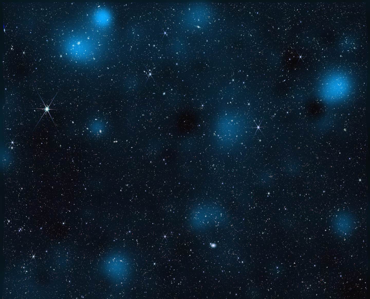 Containing nearly 800,000 galaxies, this image from NASA’s James Webb Space Telescope is overlaid with a map of dark matter, represented in blue. Researchers used Webb data to find the invisible substance via its gravitational influence on regular matter.
