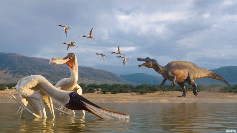 In the foreground, two Bakiribu waridza feed in a lake environment while, in the background, Irritator pursues other specimens.