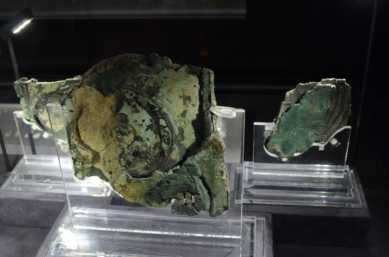 Remnants of the Antikythera mechanism, displayed in the National Archaeological Museum in Athens, Greece.