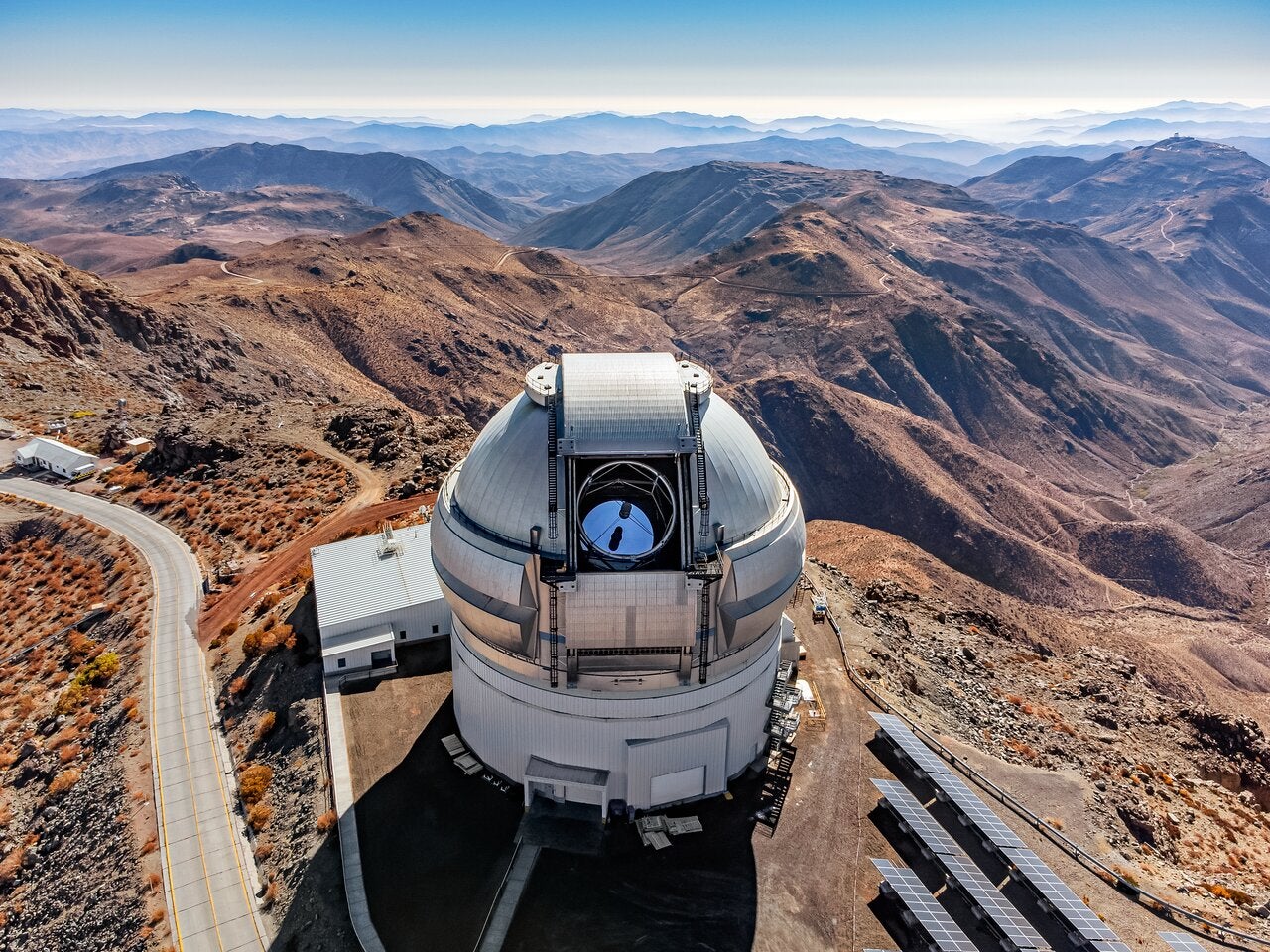 From a dizzying height, the full scale and remoteness of the Gemini South telescope, one half of the International Gemini Observatory, operated by NSF NOIRLab, can be realized.