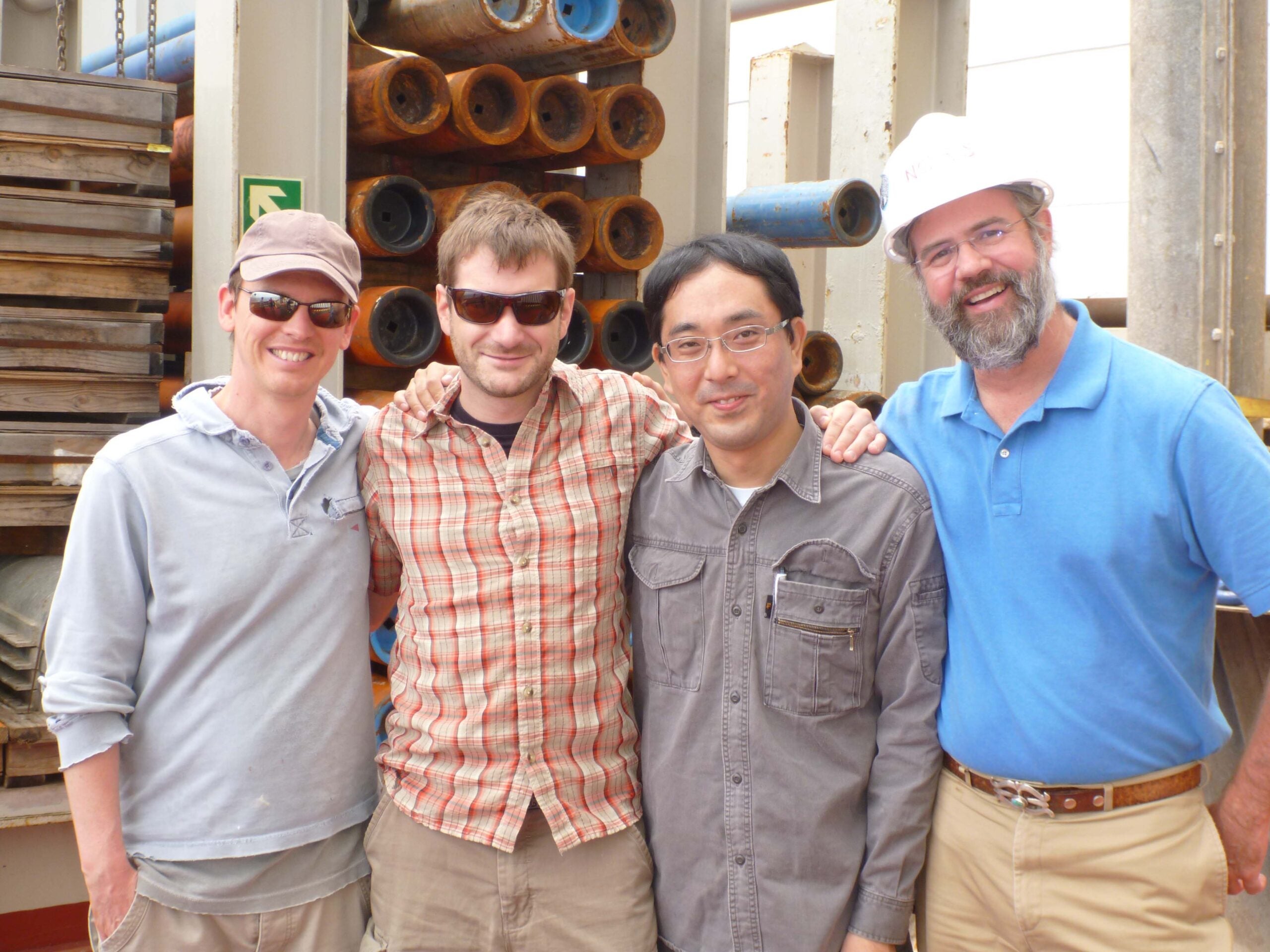 Study co-authors Peter Lippert, second from left, and Yuhji Yamamoto, third from left, aboard the JOIDES Resolution in 2012.