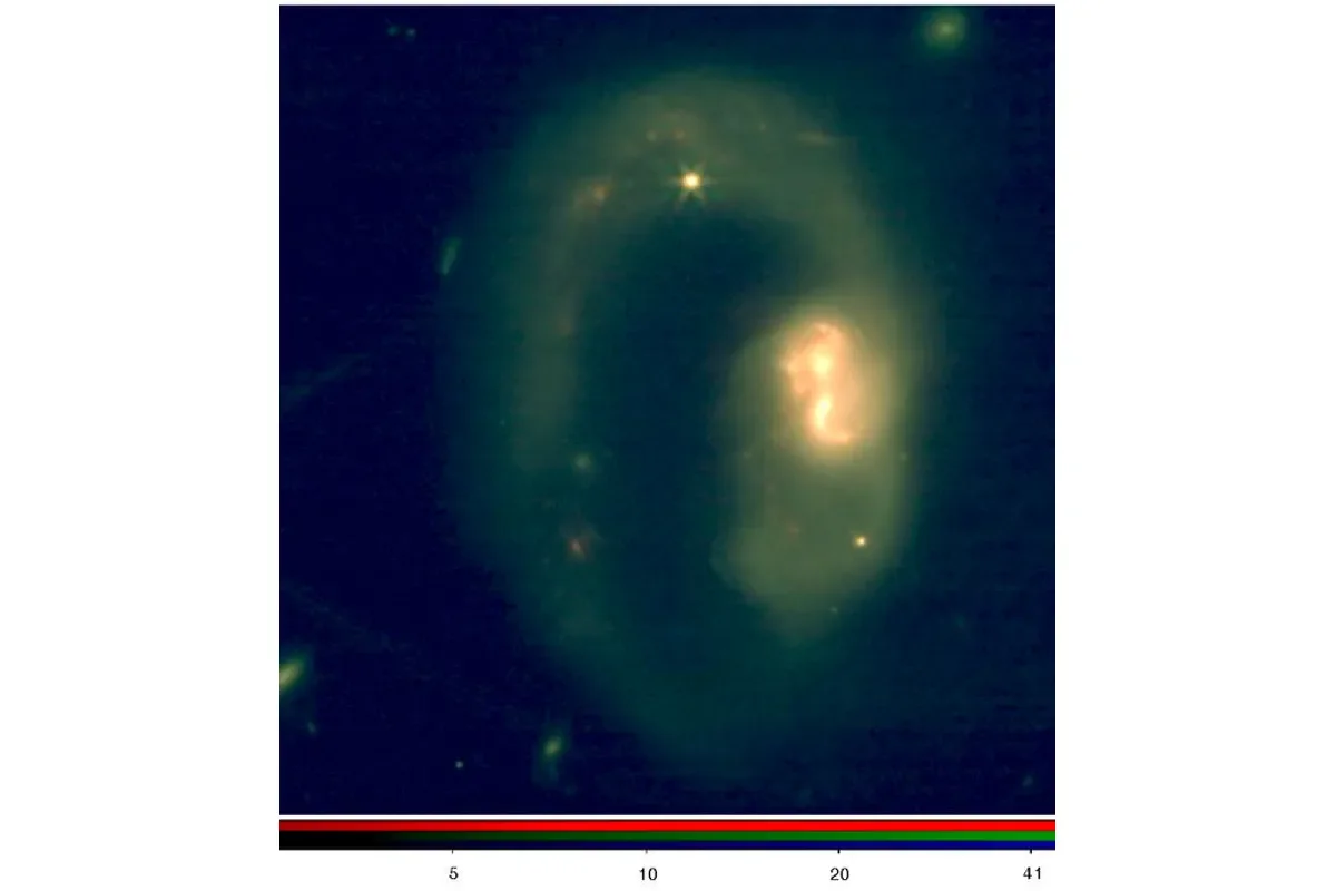 James Webb Space Telescope Near-infrared Camera (JWST NIRCam) false colour image of IRAS07251-0248, made by combining exposures with the 2 mm (Blue), 2.77 mm (Green) and 3.56 mm (Red) wide filters on NIRCam. 
