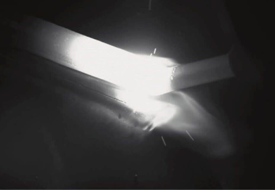Image taken by a high-speed camera during molding with the rod‑leading method.