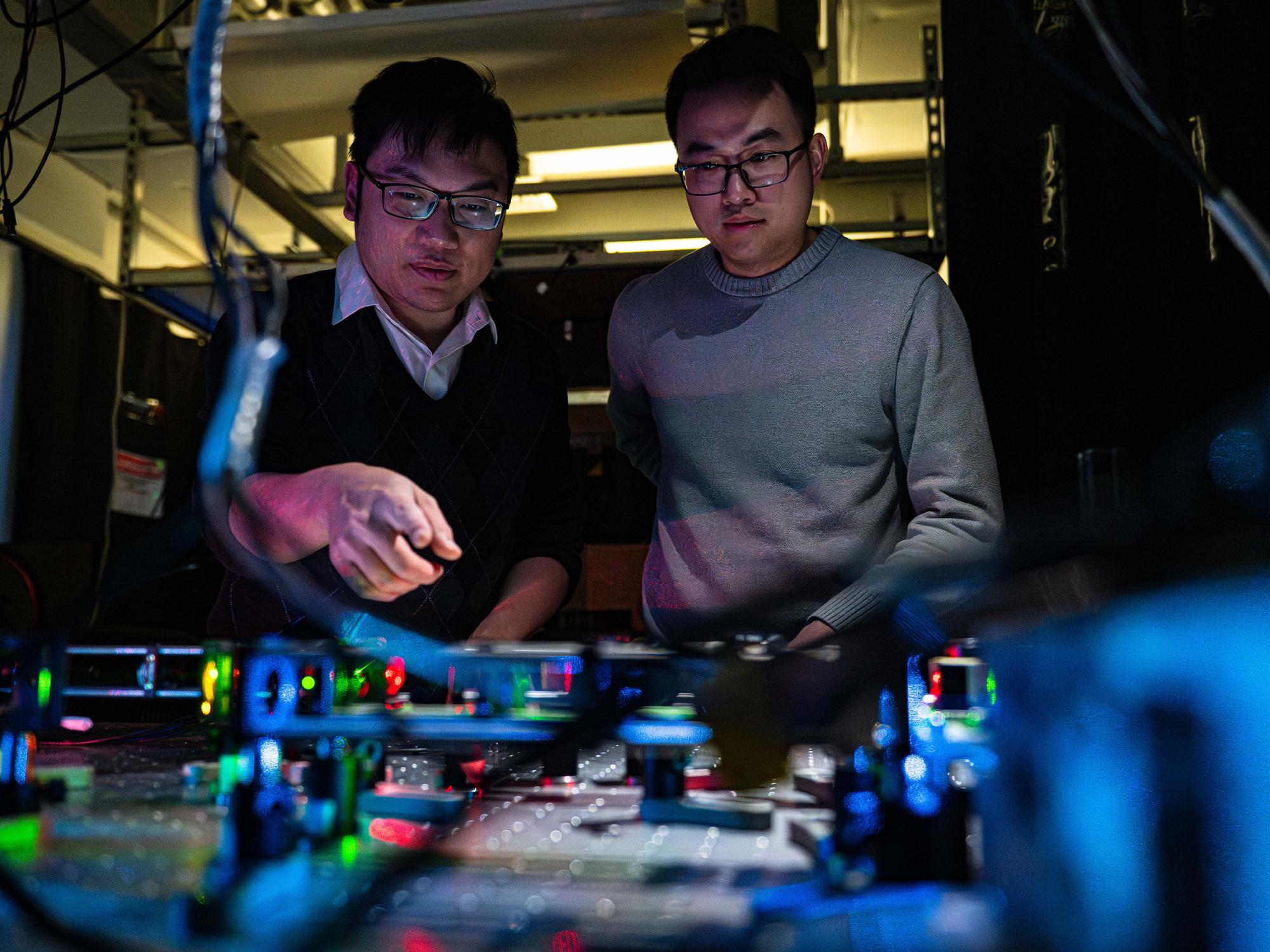 Ruobo Zhou, assistant professor of chemistry, of biochemistry and molecular biology, and of biomedical engineering, on left, co-led the study with Jinyu Fei, a graduate student in the chemistry department in Penn State’s Eberly College of Science.