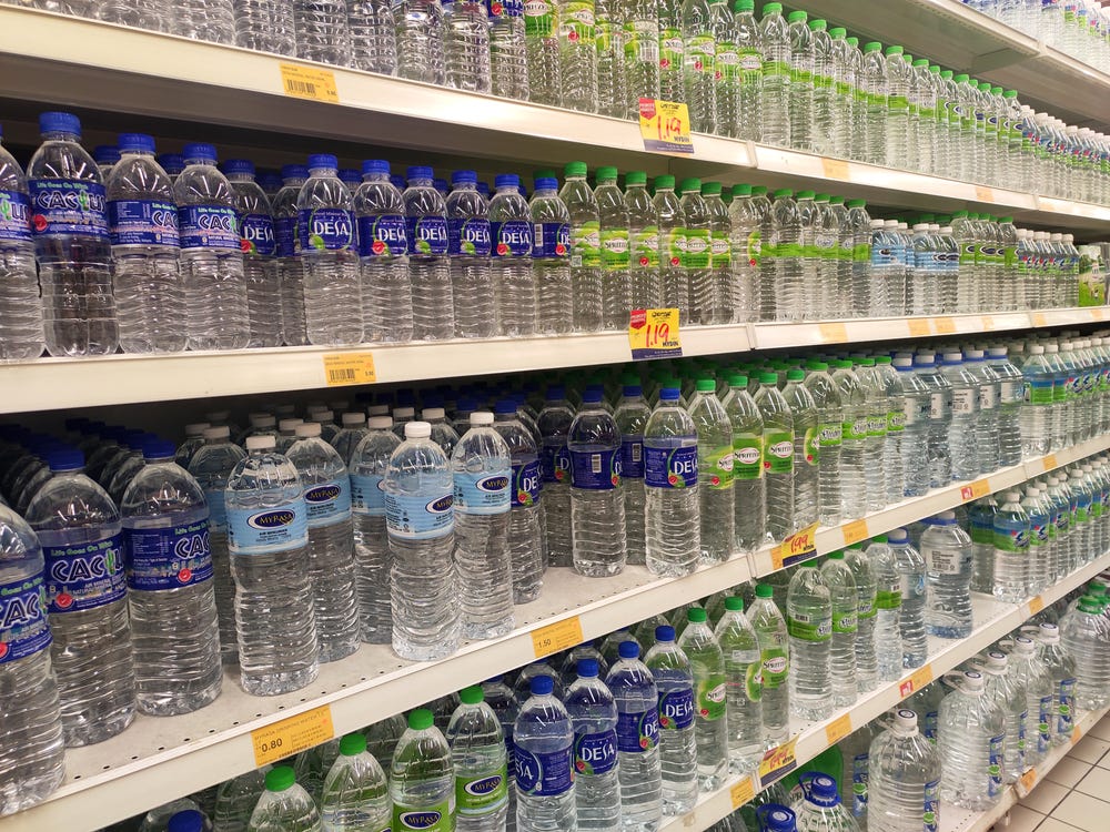 New measurements find bottled water can carry far more nanoplastic particles than treated tap water, though mass differs.