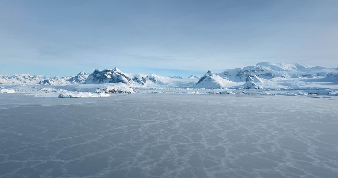 Thawing ice is activating microbes that release carbon and toxins, creating new risks for climate and communities.