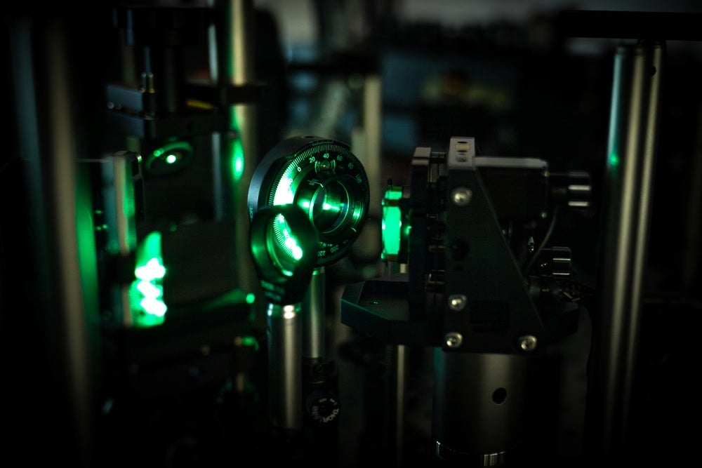 Examining a lead-halide perovskite crystal in the lab using optical methods.