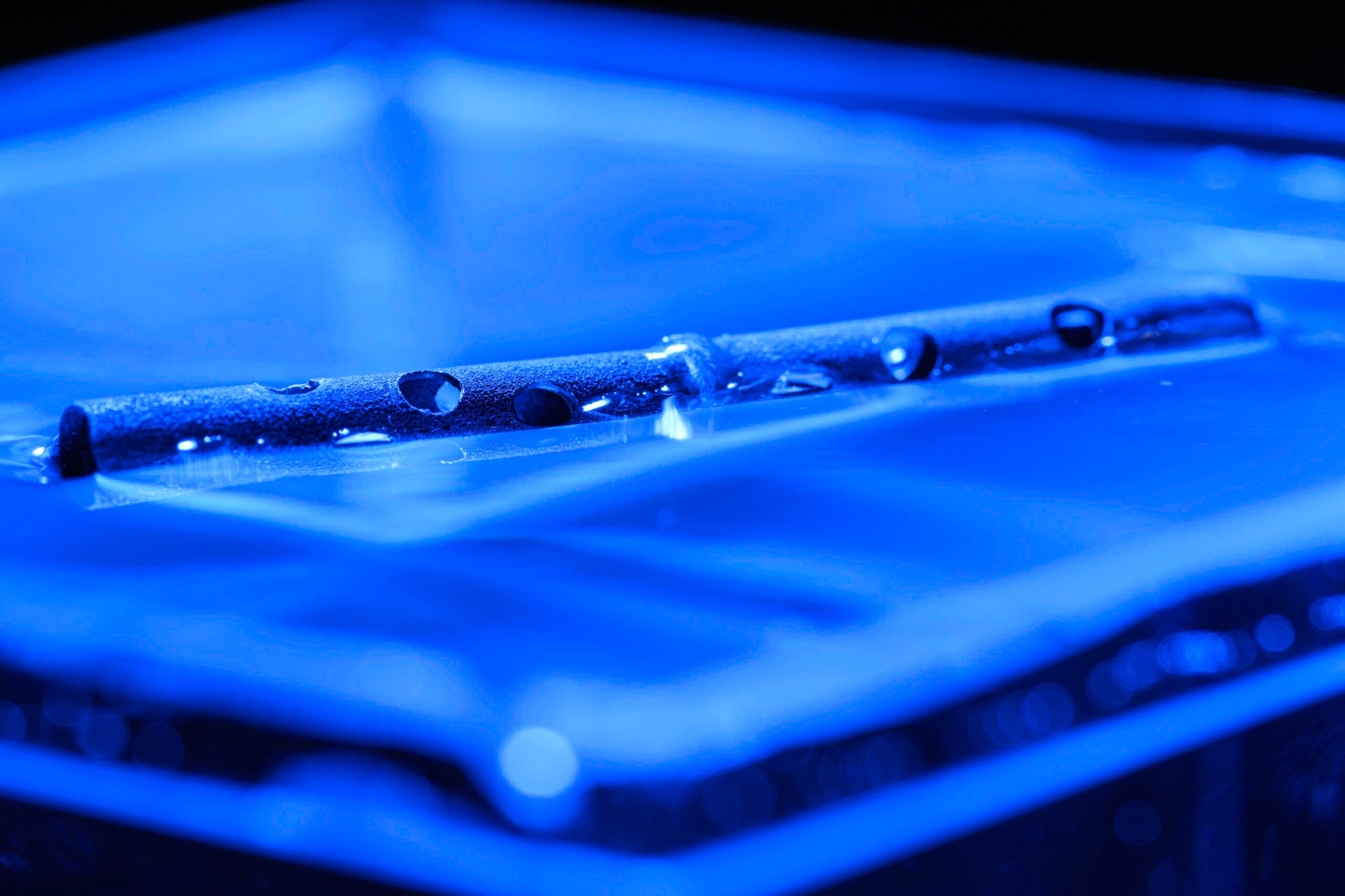 HOLEY MOLY: “If you severely damage the tubes with as many holes as you can punch, they still float,” says Guo.