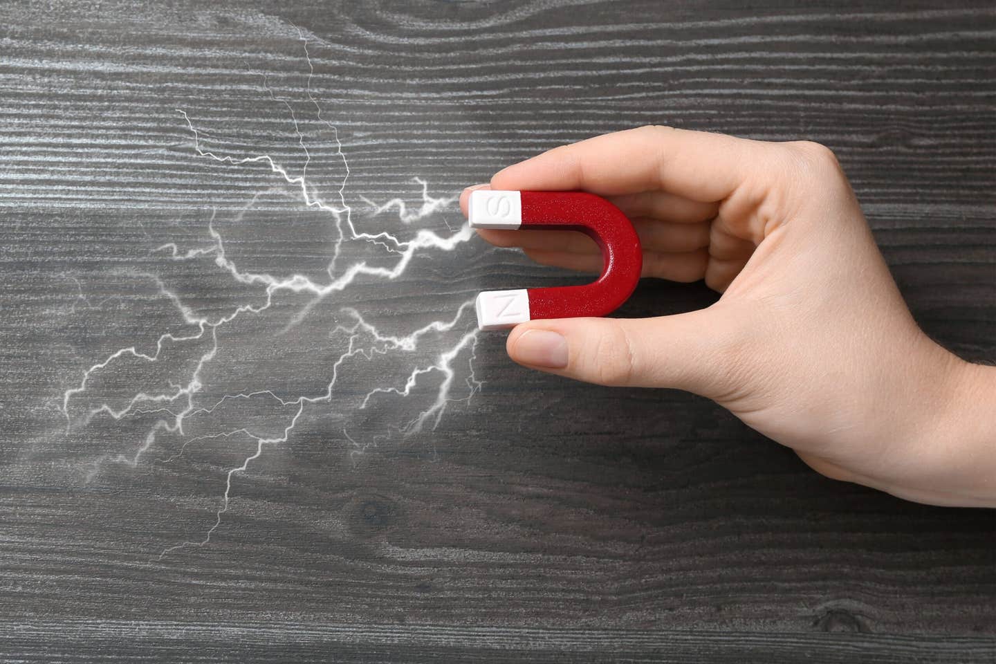 A new study reveals friction can arise without contact, driven by magnetic dynamics that challenge a centuries-old physics law.