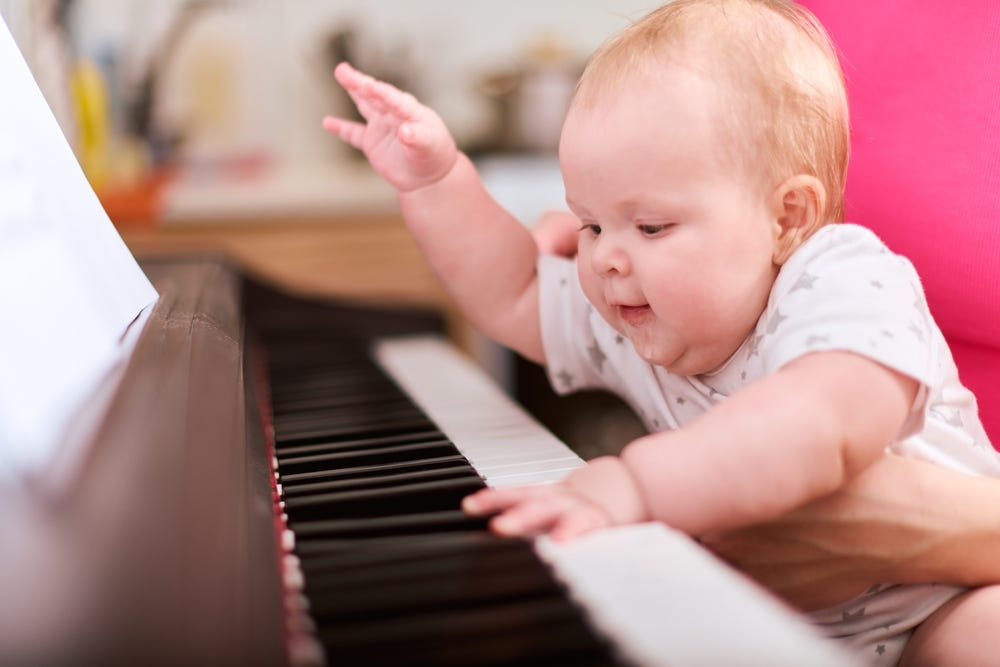 Research suggests humans may be biologically wired for music, with musical abilities appearing in infancy and across cultures.