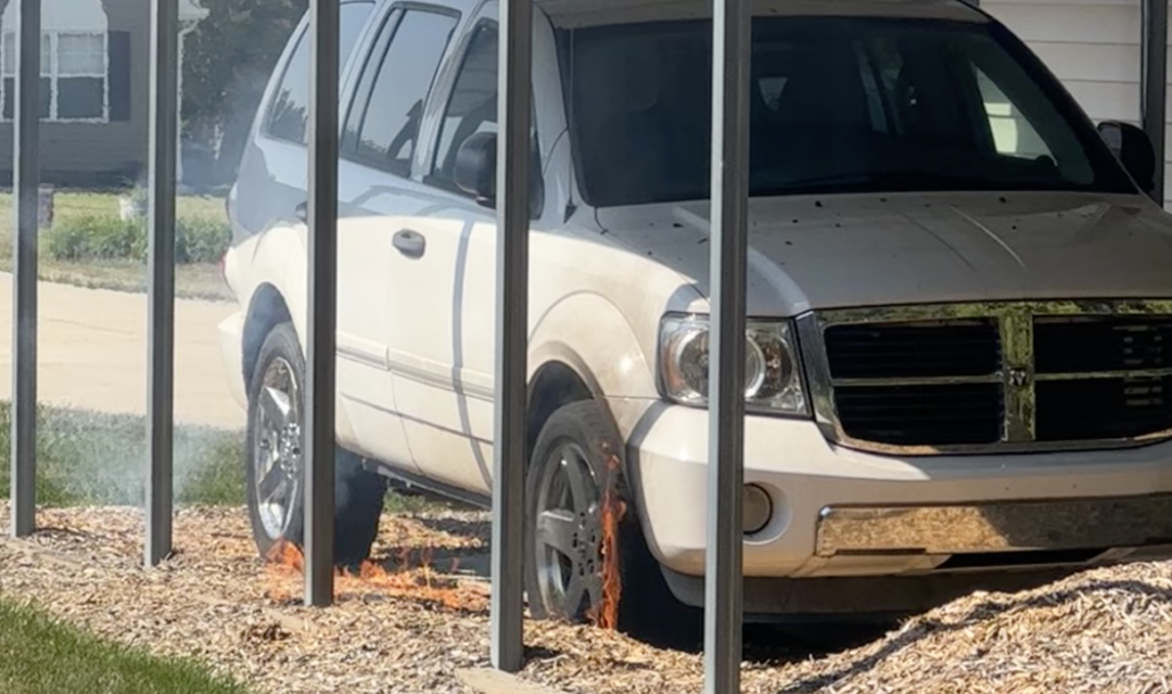 Through the woman’s camera, he told her that her house was on fire.