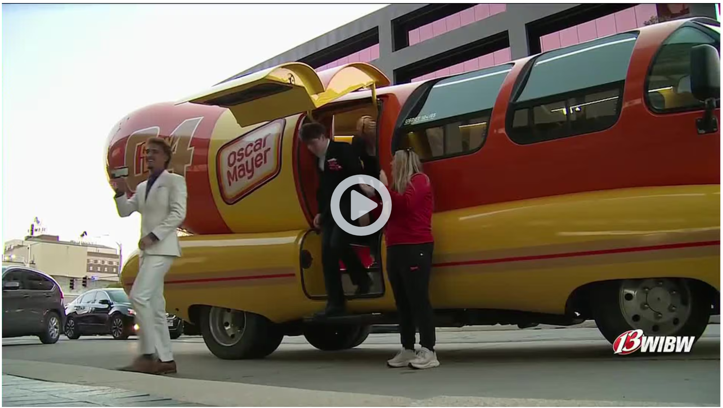 A group of Seaman High School students did a little bit of hot-dogging with their ride to prom, convincing the Oscar Mayer Weinermobile to give them a lift.