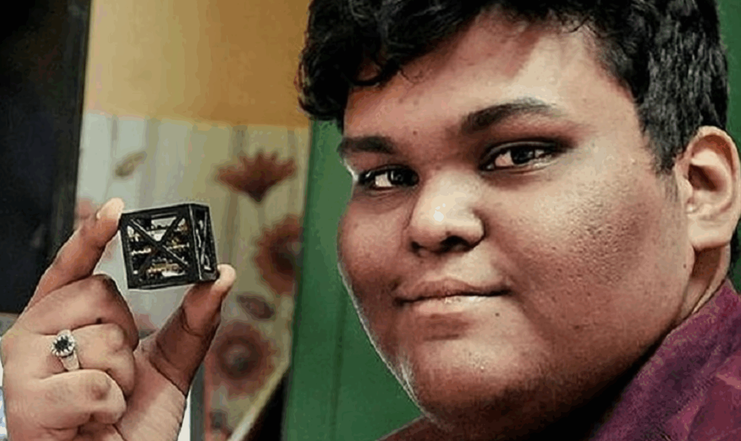 Lead scientist Rifath Shaarook with KalamSat which flew aboard a NASA Terrier Orion sounding rocket from Wallops Flight Facility in Virginia on June 22, 2017.