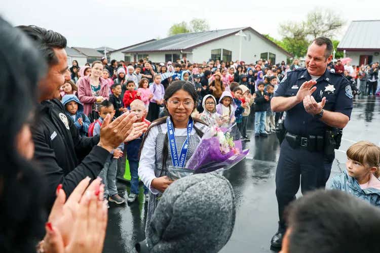 Leilani Cienega is honored at a school assembly after she saved her mom.