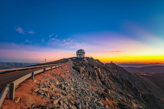 Crepuscular rays at dusk are seen here over the Gemini South telescope, one half of the International Gemini Observatory, which is supported in part by the U.S. National Science Foundation and operated by NSF NOIRLab. 