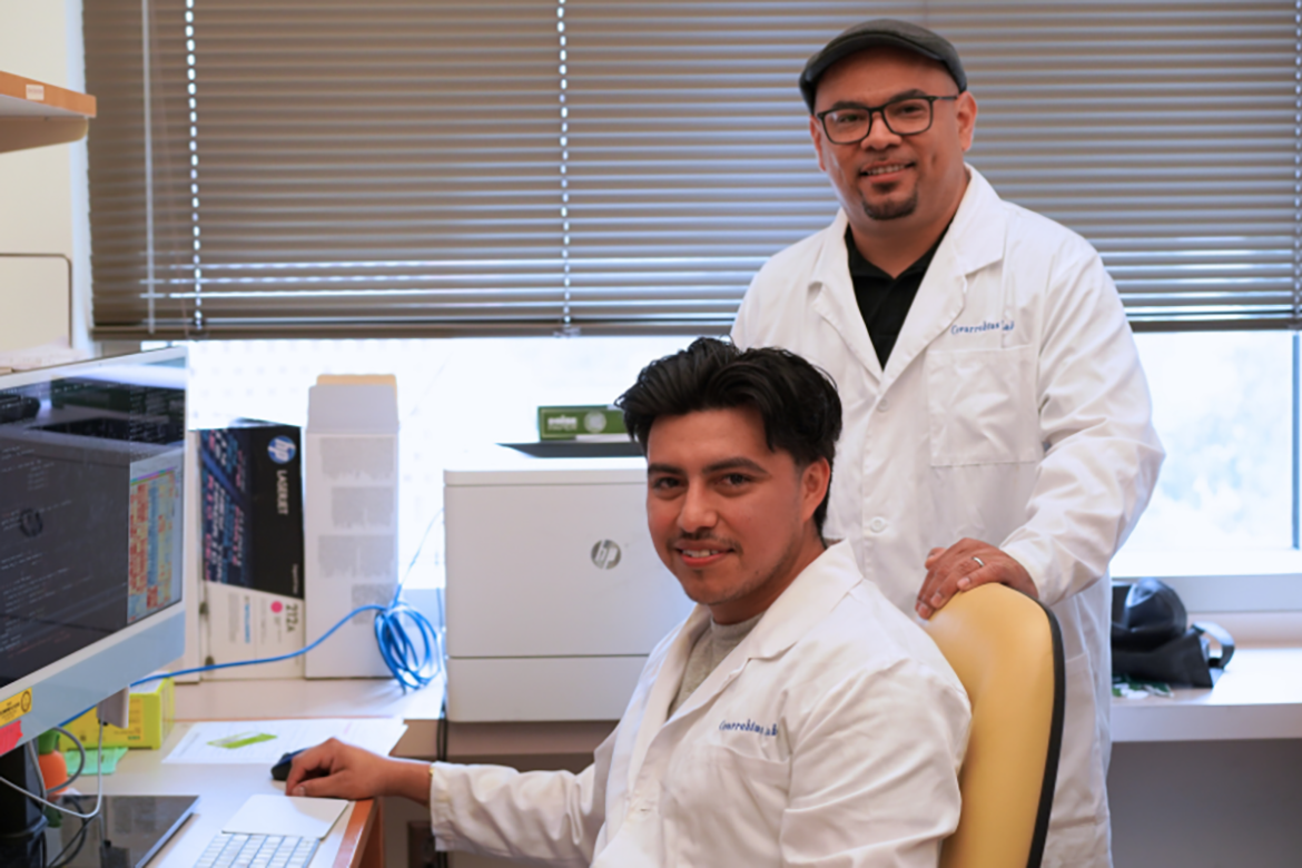 Ivan Salladay-Perez (left) and Anthony Covarrubias (right) in the lab. 
