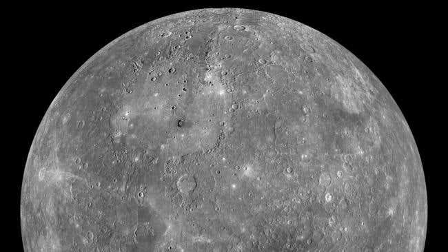 This high-resolution photo of the planet Mercury probably resembles the rocky exoplanet LHS 3844 b. Results from JWST observations favour an airless rocky planet with a dark, basalt-like surface, likely space-weathered by irradiation and meteorite impacts.