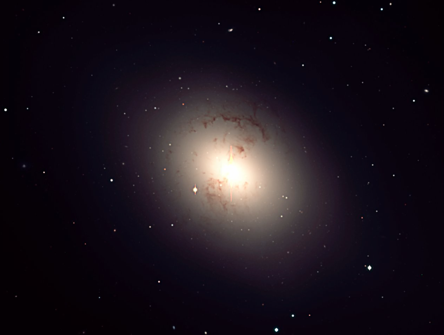 JWST found a massive early galaxy with almost no rotation, challenging standard ideas of how giant ellipticals form. Image is actually Giant elliptical galaxy NGC 1316 in Fornax Cluster, used for illustrative purposes only.