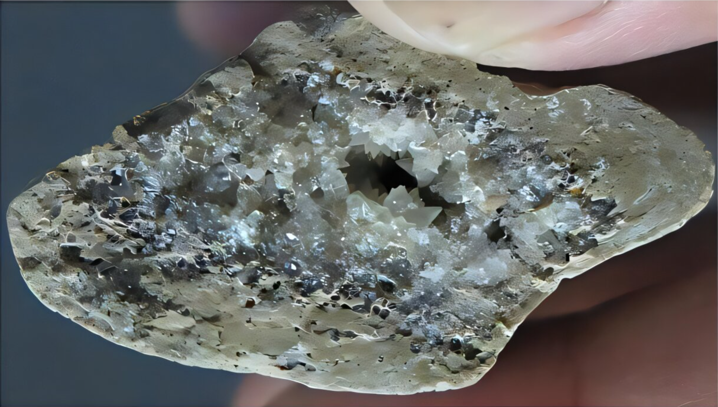 Crystals growing inside a bone found at the Lingjing archaeological site; these crystals were used to date the site, and the tools found there, to an ice age 146,000 years ago.