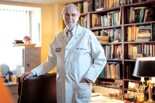Neuroscientist Marcus Raichle in his office at NeuroImaging Laboratories, part of the Mallinckrodt Institute of Radiology.