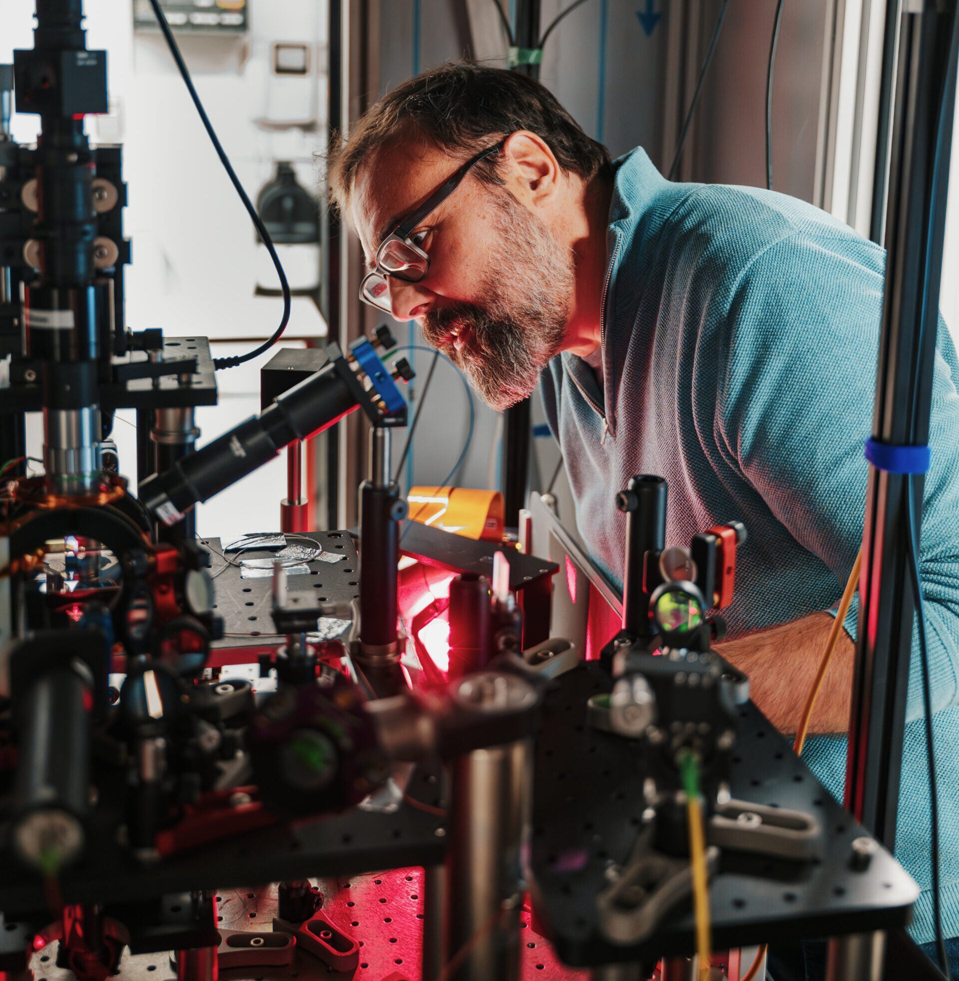 Giovanni Barontini, Professor of Physics, at the University of Birmingham, using the apparatus to trap and cool rubidium atoms.
