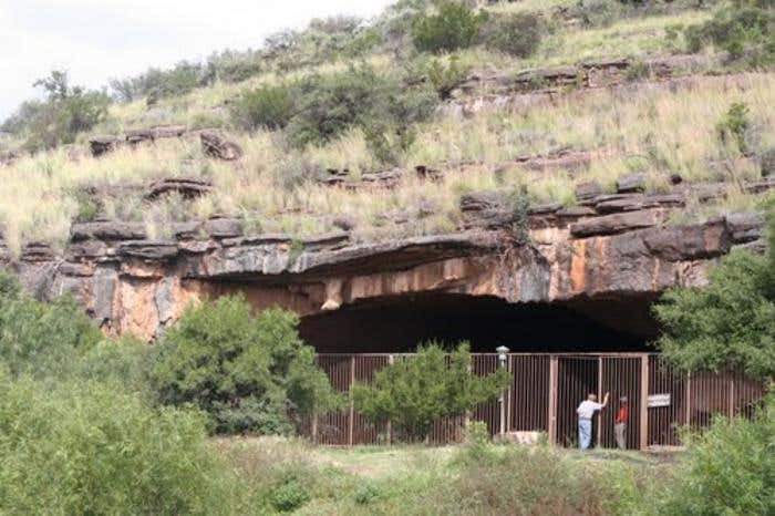 The Wonderwerk Cave entrance. Burned fossil bones in Wonderwerk Cave suggest early humans used fire there between 1.07 and 1.79 million years ago.