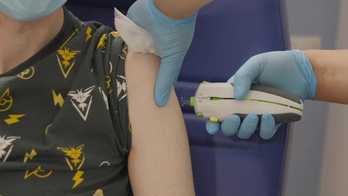 The super antigen is compatible with most vaccine delivery systems. In this trial it was administered as DNA vaccine through a micro fluid jet. This needle-free delivery method offers an alternative to those with a fear of needle-based injections.