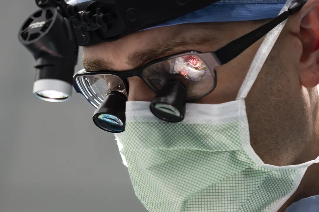 After implantation of the device, Dr. Matthew Willsey secures and closes the wound.