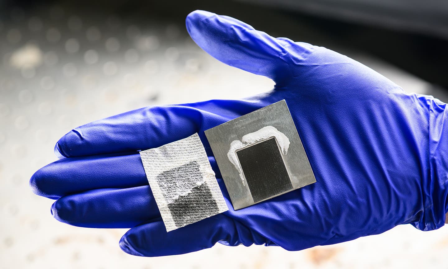 Researchers developed a solar-powered desalination device featuring laser-etched superwicking black metal (right). Unlike existing solar desalination systems (left), Professor Chunlei Guo’s design prevents salt and mineral buildup from clogging the surface.