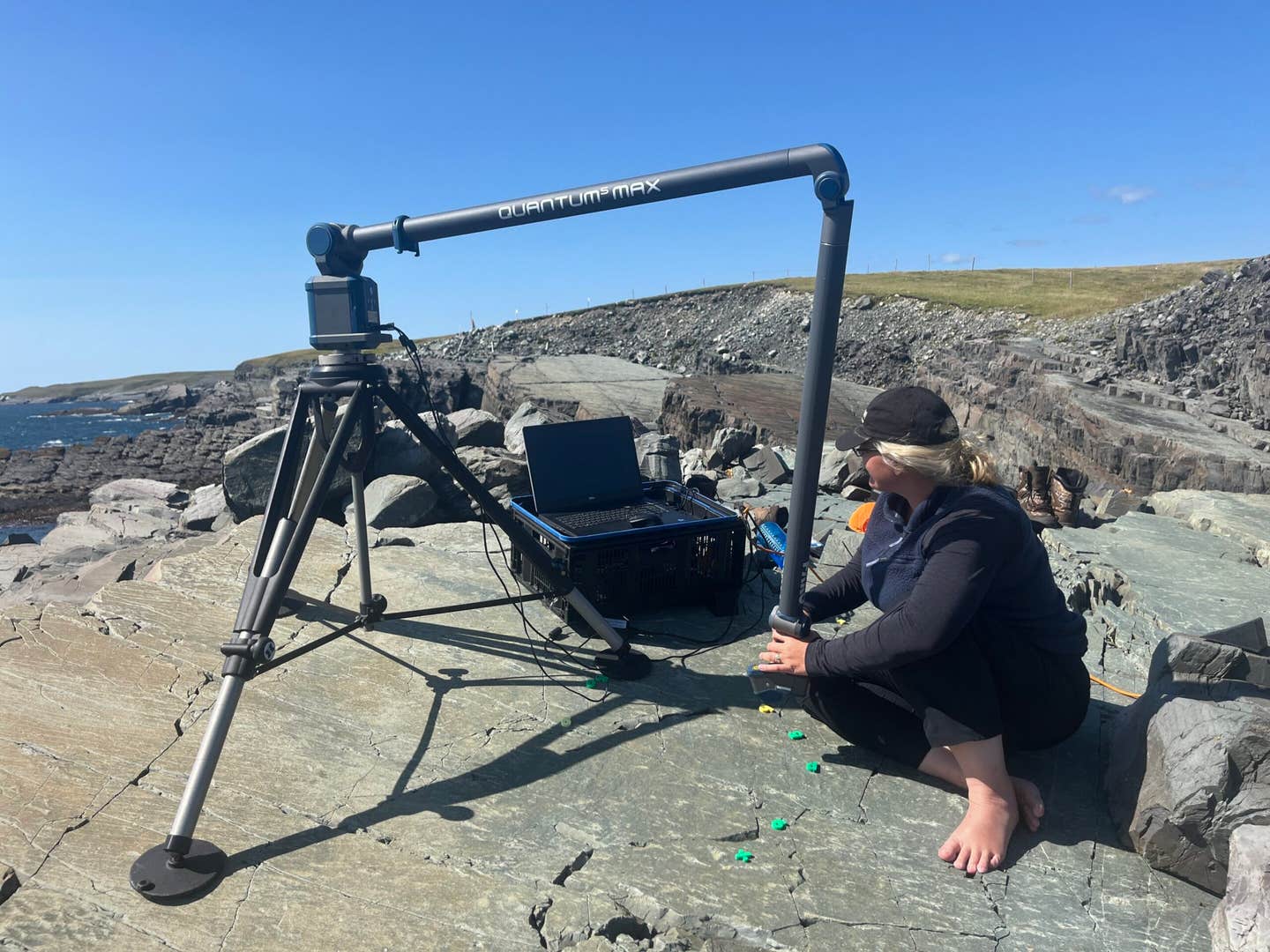 Dr. Emily Mitchell at Mistaken Point, Newfoundland, Canada. Her research suggests clone-based reproduction kept early animals stable until sexual reproduction boosted diversity.