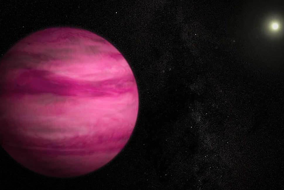 Discovered in 2013, the Pink Planet orbits a sun-like star located 57 light-years from Earth. At roughly 25 times the mass of Jupiter, it sits near the fuzzy boundary between giant planets and brown dwarfs.