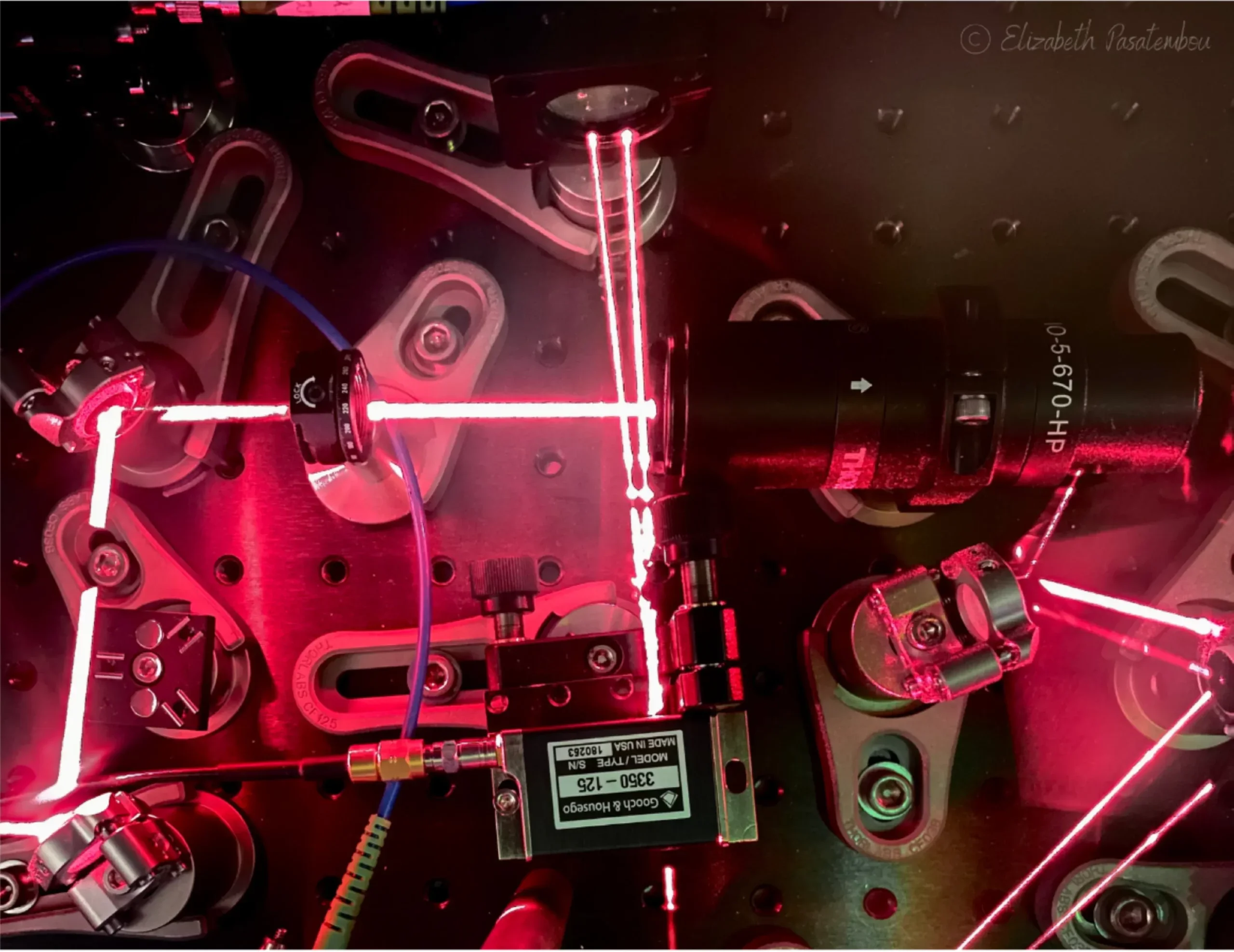 Building a quantum sensor requires light with precisely controlled frequency, polarization, and intensity. In this image, a red laser’s frequency is adjusted before it is used to cool atoms to near absolute zero.