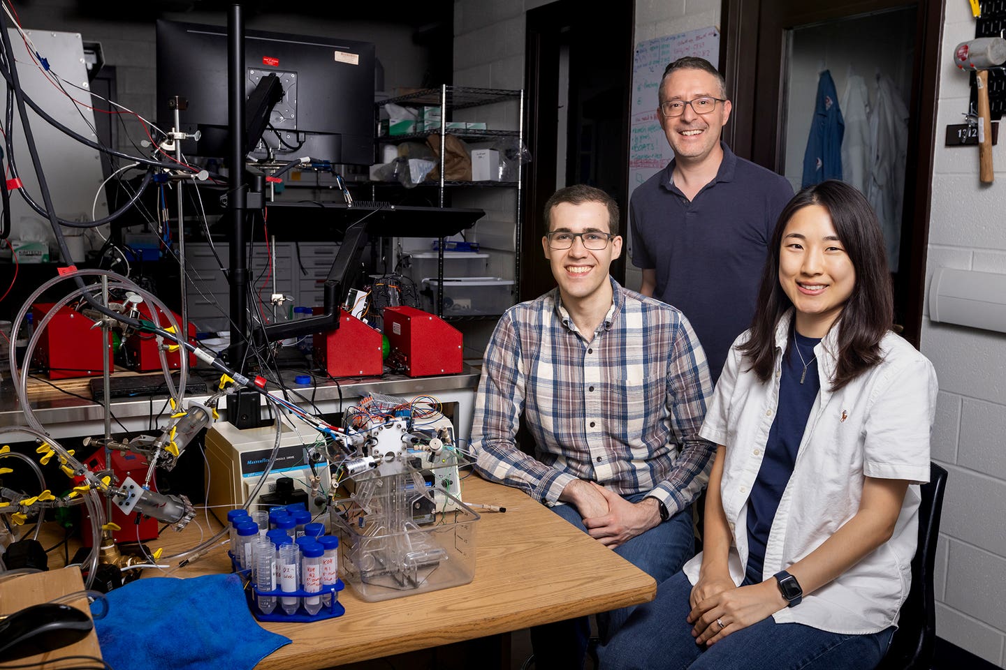 Mechanical Science and Engineering (MechSE) Associate Professor, Kyle Smith (middle) and PhD students, Paul Rozzi (left) and Jenna Lee (right), have developed a new battery-type device that can capture CO2 from the air.