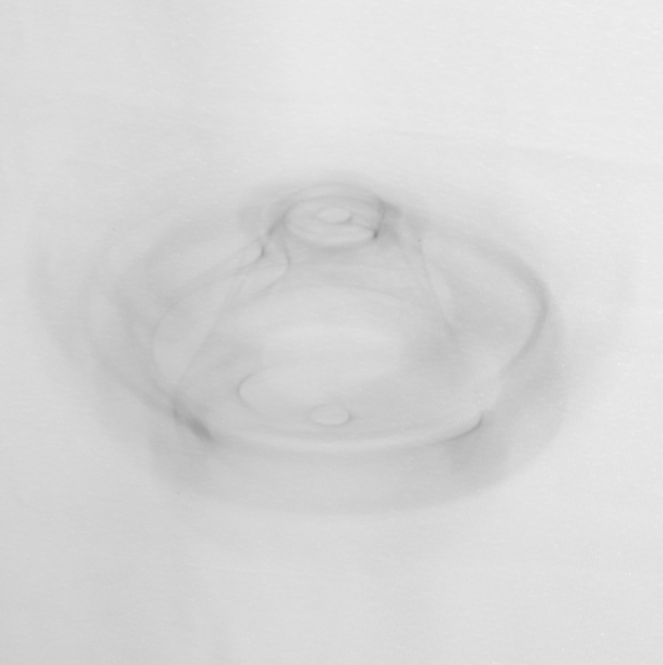 Spinning drone shown at a 60-degree angle on a white background