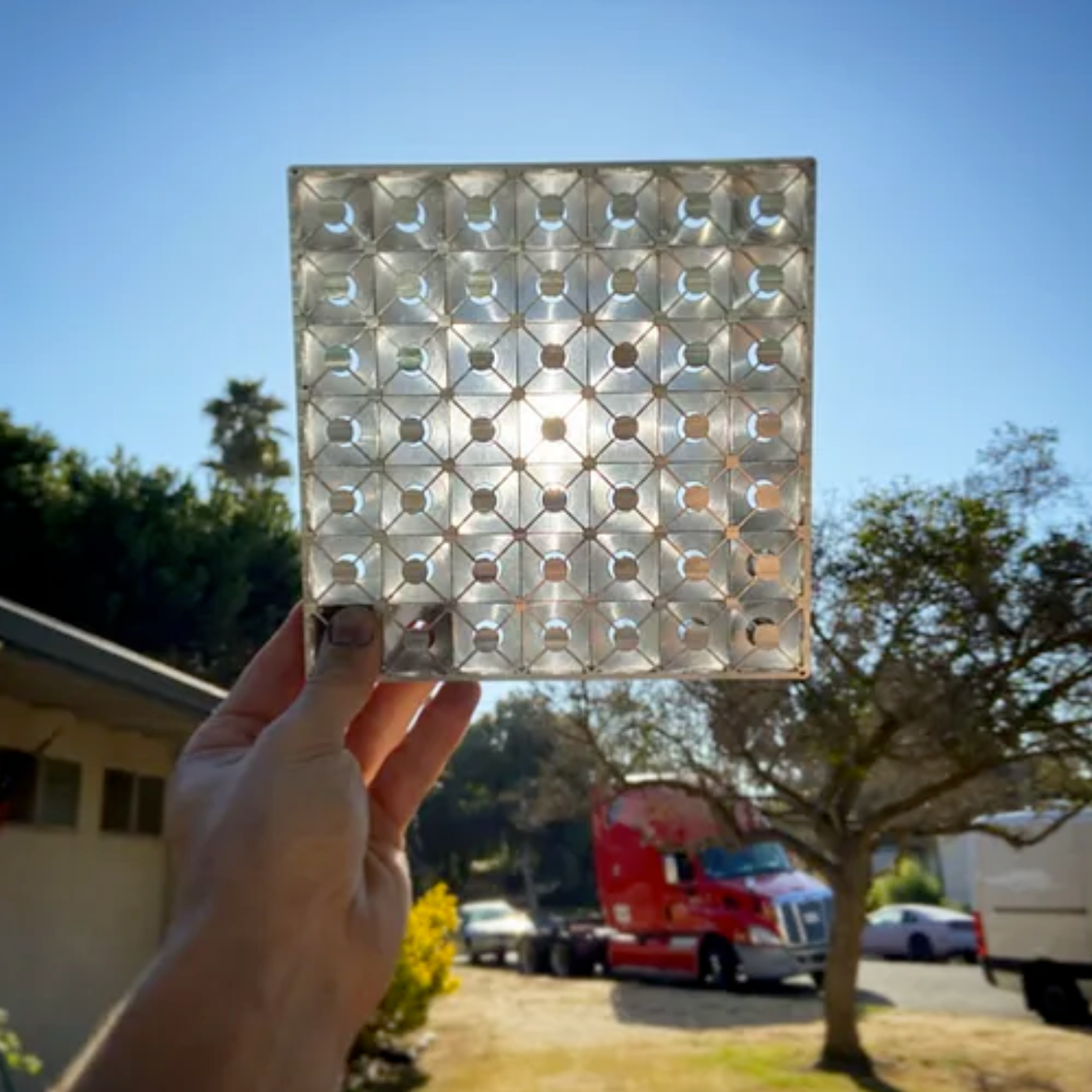 Early collimator prototype to focus sunlight in orbit.