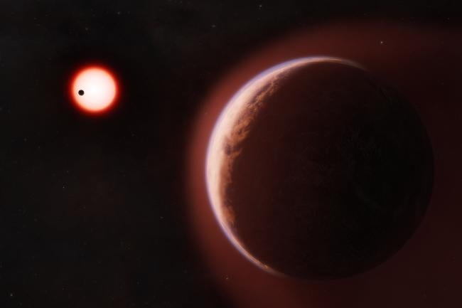 First rocky planet with an atmosphere located in the habitable