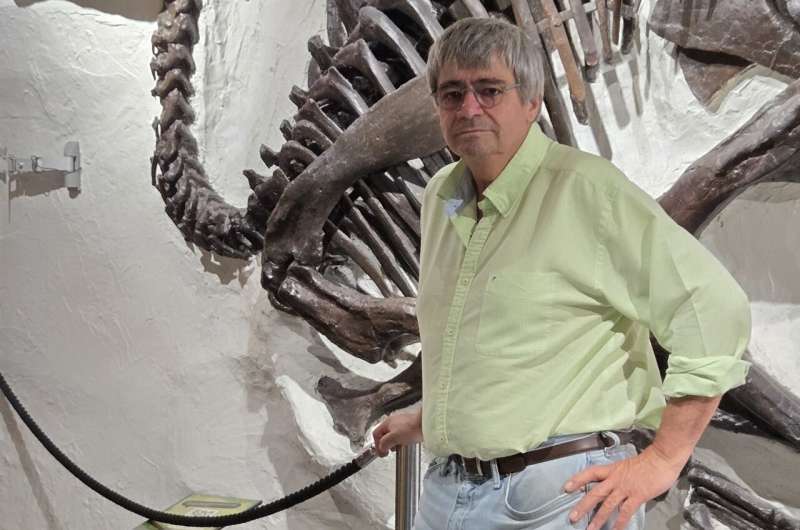 Dr. Philippe Claeys, a visiting professor at the University of British Columbia, in front of an exhibit at the Pacific Museum of Earth.