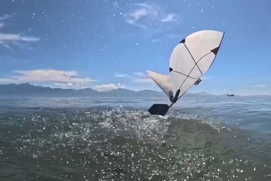 The aerial-aquatic robot can swim underwater, then flap out of the water to continue flying through air, much like diving birds.